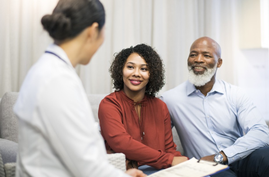 Husband and wife with doctor